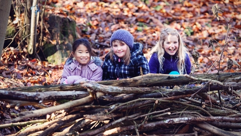 Girls in woodland by Nick Ilott