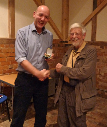 Colin Raven (left) receiving his Worcestershire Wildlife Medal from Harry Green (right)
