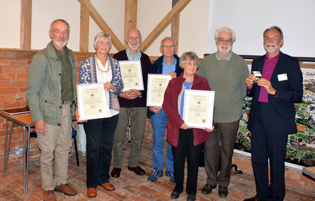 Group of men and women holding their Worcestershire Wildlife Medal certificates