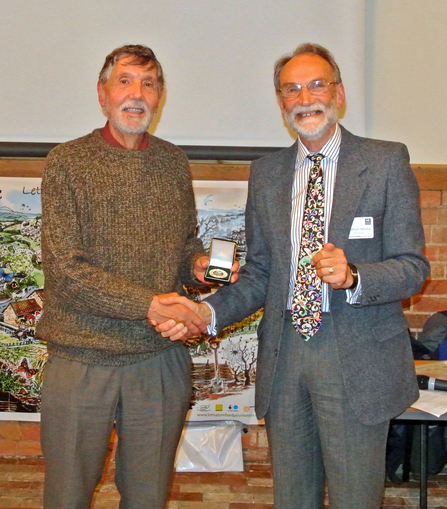 Geoff Trevis receiving his Worcestershire Wildlife Medal from Trust Chairman Graham Martin