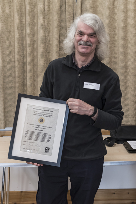 John Bingham holding his Worcestershire Wildlife Medal certificate by Roger Plant