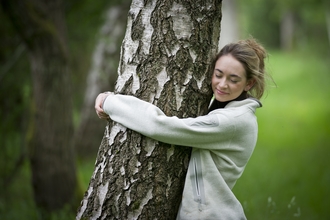 Hugging a tree by Matthew Roberts