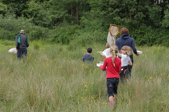 Family enjoying Ipsley Alders Marsh
