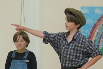 Pupils from Pendock Primary School performing 'Where the Meadows Flower' (by Stephanie Grainger)