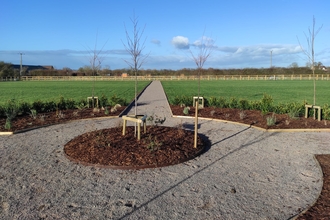 Natural Networks project at Badsey and Aldington Parish Council - circular path with paths leading off it and flower beds in the middle and around the outside