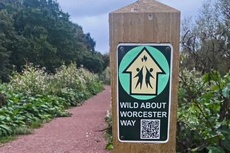 Wild about Worcester Way waymarker alongside a path