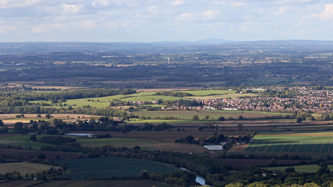 Worcestershire landscape seen from Bredon Hill - fields, hedges, trees, towns by Wendy Carter