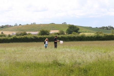 People exploring Hardwick Green Meadows by Wendy Carter