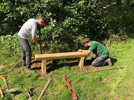 Jake and Iain installing a bench