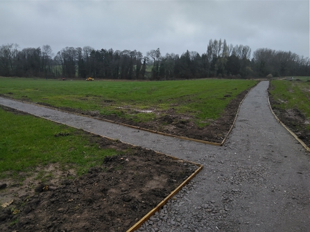 A nearly completed pathway at the entrance to Bull Meadow