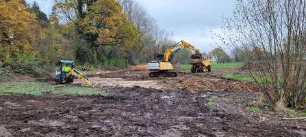 Two diggers digging the main pond at Bull Meadow