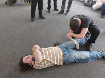 Trainees practicing first aid