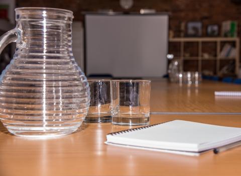 Jug in a conference room by Neil White