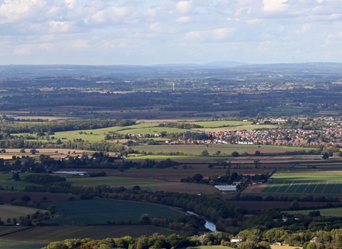 Worcestershire landscape seen from Bredon Hill - fields, hedges, trees, towns by Wendy Carter