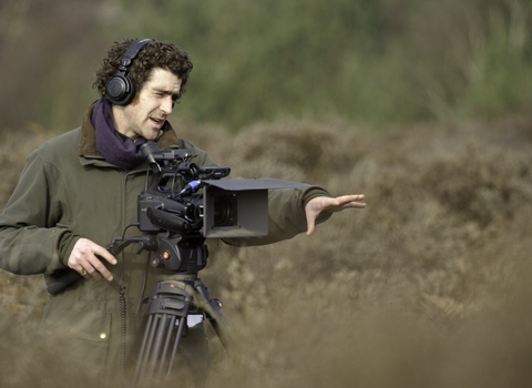 Man filming on a nature reserve by Chris Gomersall/2020VISION